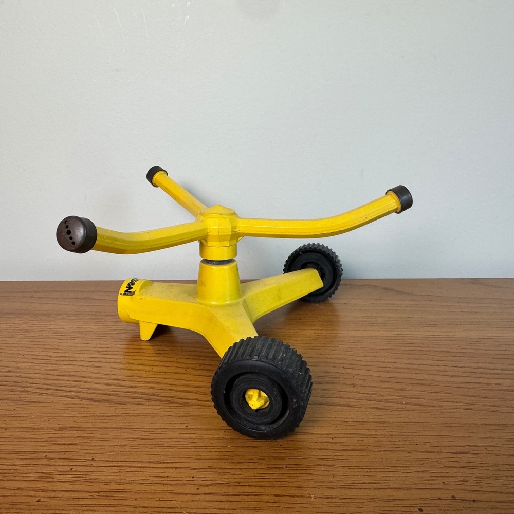 Vintage Nelson Yellow Metal Rotating 3-Arm Lawn Sprinkler with Wheels